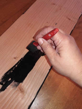 Painting the Wood for the Sign Black